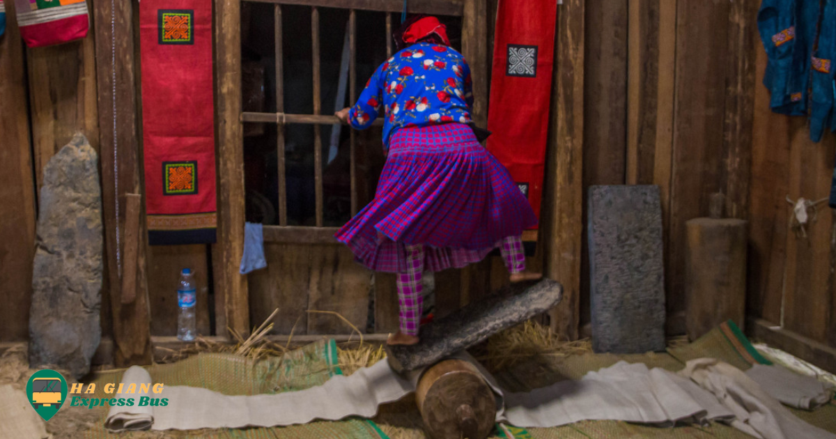 A group of women weaving traditional linen fabric on wooden looms in Lung Tam Linen Village, surrounded by vibrant colors and intricate patterns